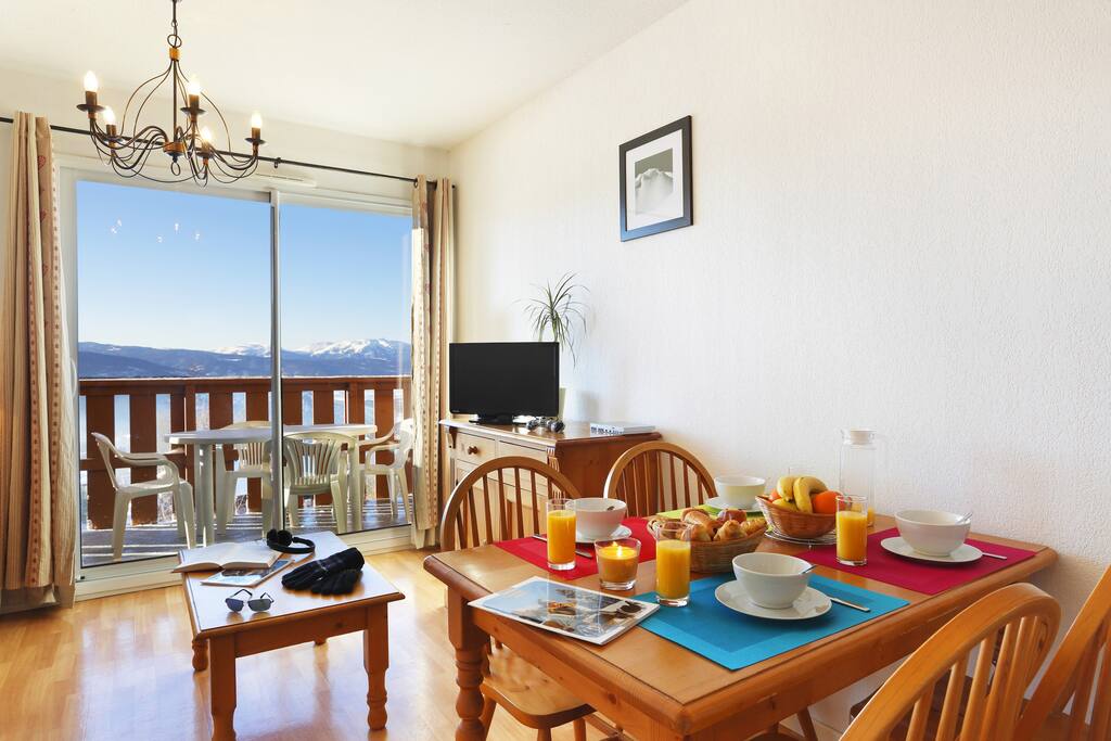 The living area is warm and cozy, perfect for relaxing after a wonderful day.