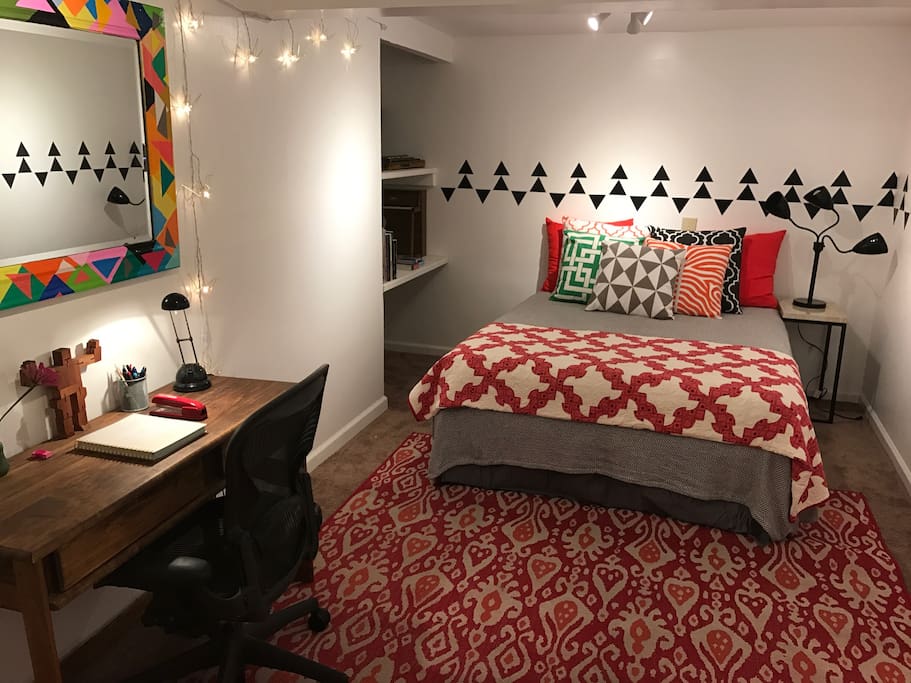 Queen bed and desk with Herman Miller Aeron chair