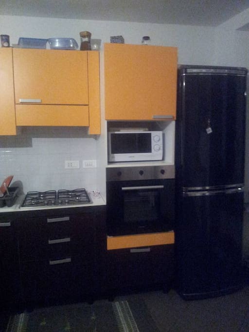 Kitchen with Fridge, oven and stove you can use of course