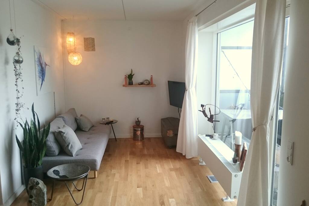TV/sofa bed area - the sofa-bed pulls out to 140 x 200cm