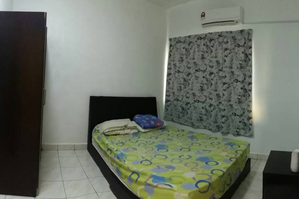 one of the room with queenbed, airconditon, lighting, closet and dressing table