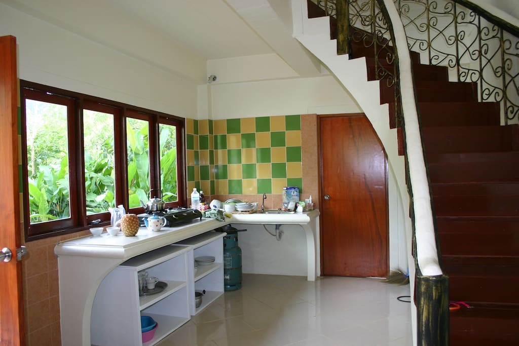 Kitchen and curved staircase