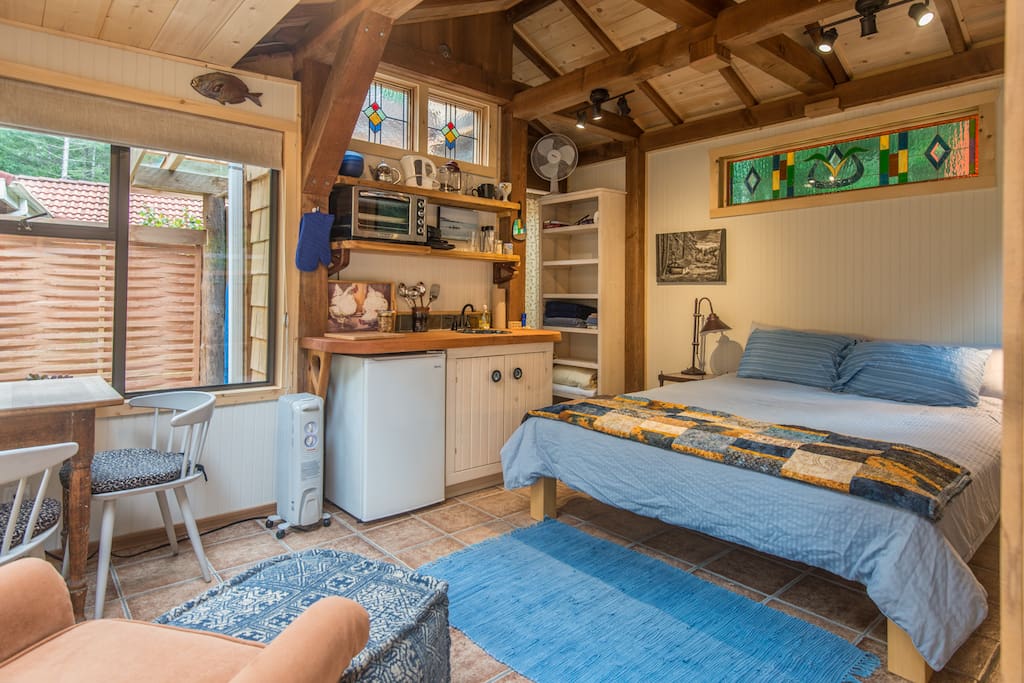 This is a compact space but is comfortable, attractive and has most amenities. This photo was taken with a wide angle lens making it appear larger than life!