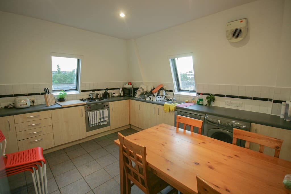 The kitchen! (you'll get half a fridge)