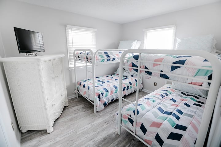 Bunk room with 4 twin bunk beds