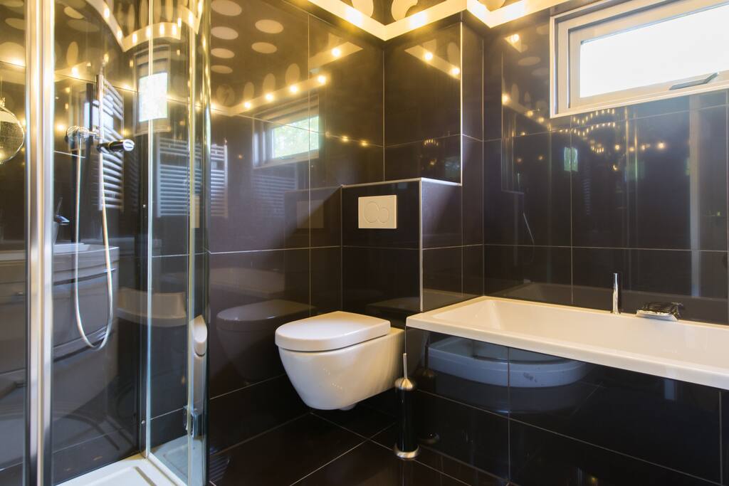 refurbished bathroom with shower and bath tub and things you might have forgotten