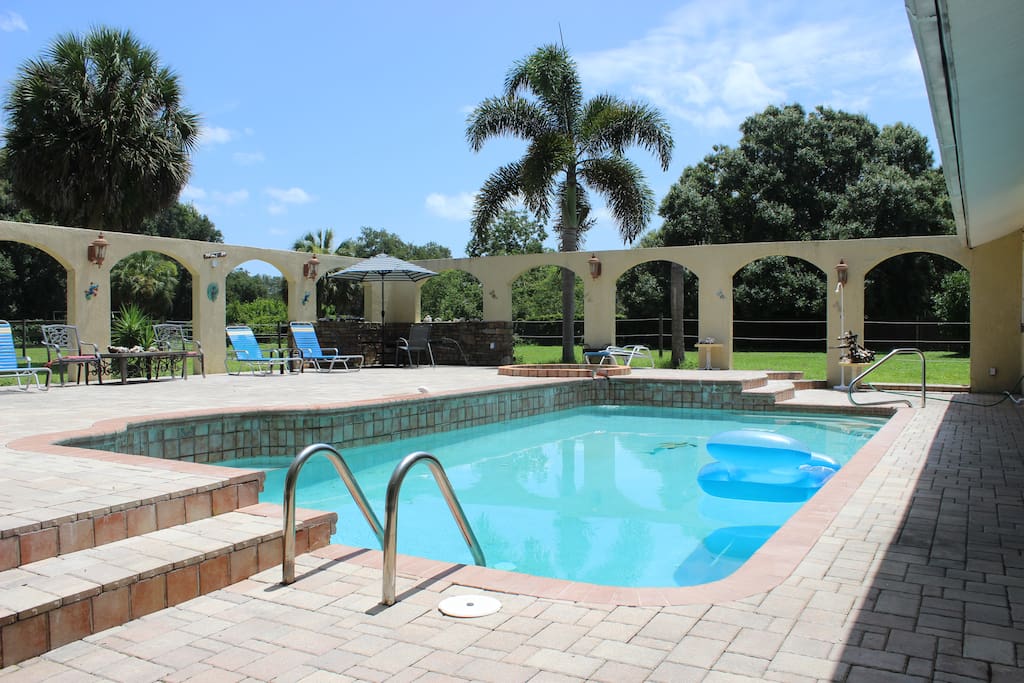 Enjoy the pool, spa, outdoor fireplace and kitchen
