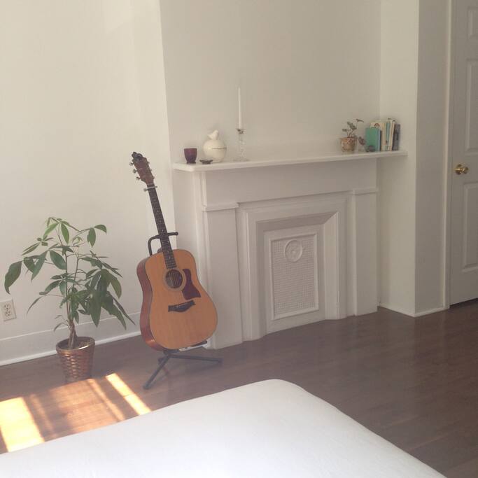 Master bedroom ornamental fireplace. With a separate entrance door and French doors leading into the child’s bedroom.