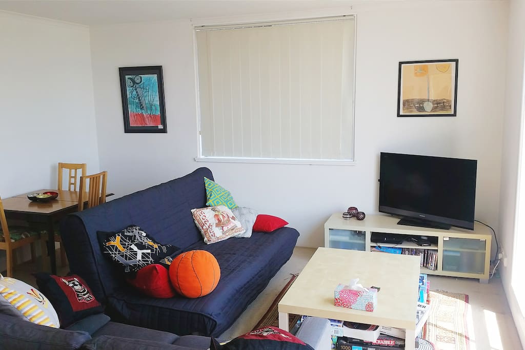 Lounge area including sofa bed.
