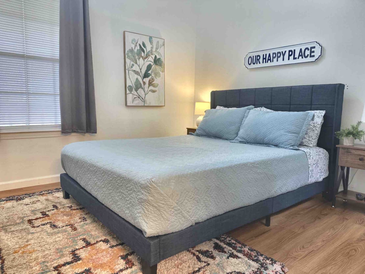 Main floor private bedroom with new queen bed and linens. 