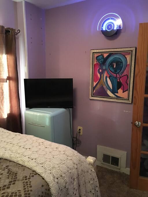 Funky art cute retro mini fridge Tv and little treats inside fridge