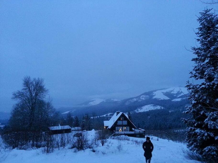 AirBnB guests on a morning walk through the snow above our house.