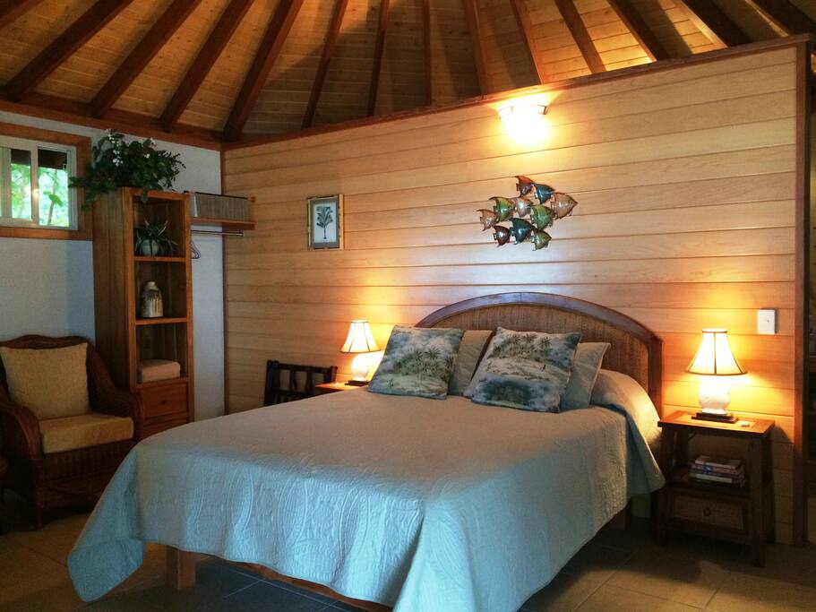 Pillow-top Queen mattress, tropical furnishings, screened windows, ceiling fan, cupola...