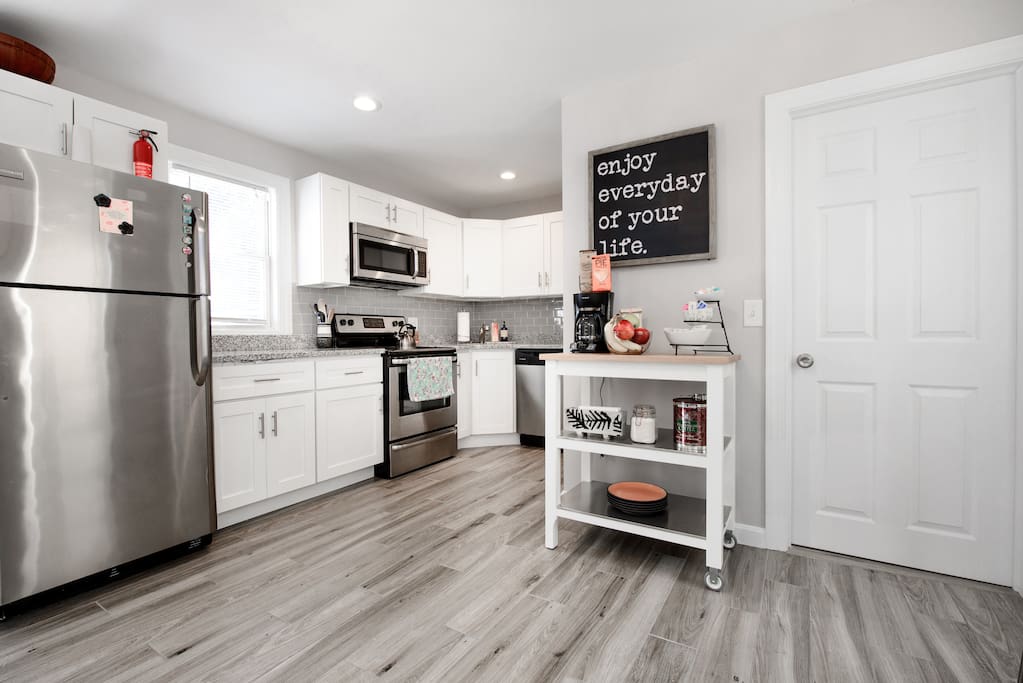 First floor kitchen, fully stocked with a snack bar which includes coffee, tea, candy, and fresh fruit.