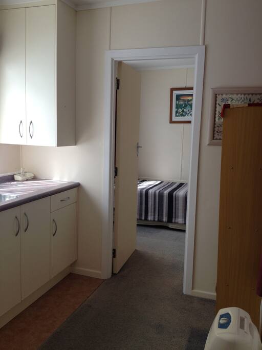 Showing kitchenette next to the bedroom