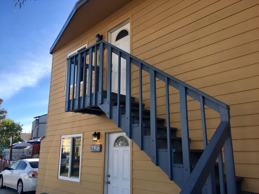 Front door & parking spot (white car)