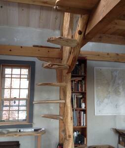 Hand built cabin overlooking a pond