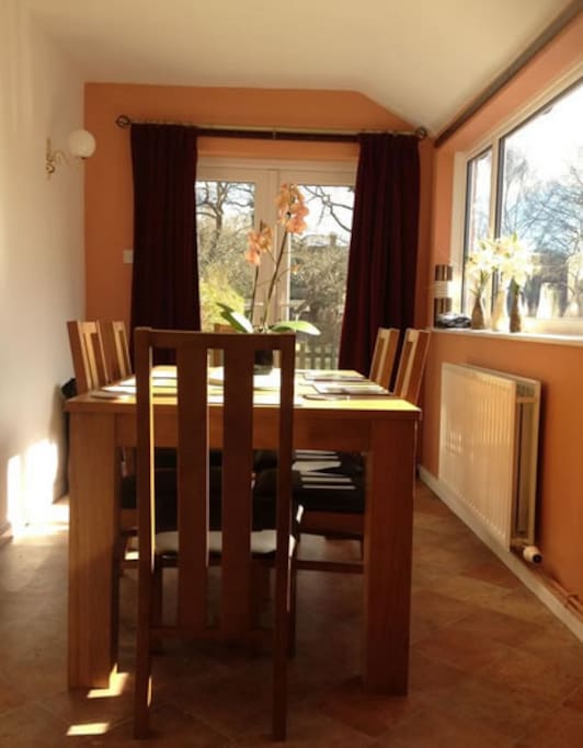 Dining room with 6 seat oak table.