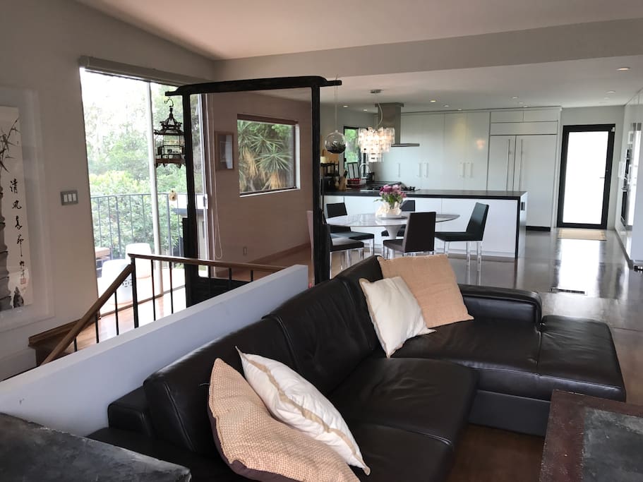 huge couch looking into kitchen