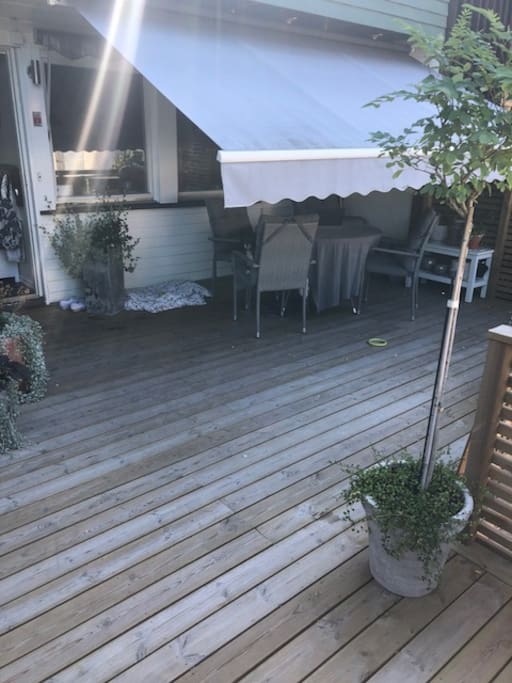 Lovely outdoor space with dining table, Weber Grill etc