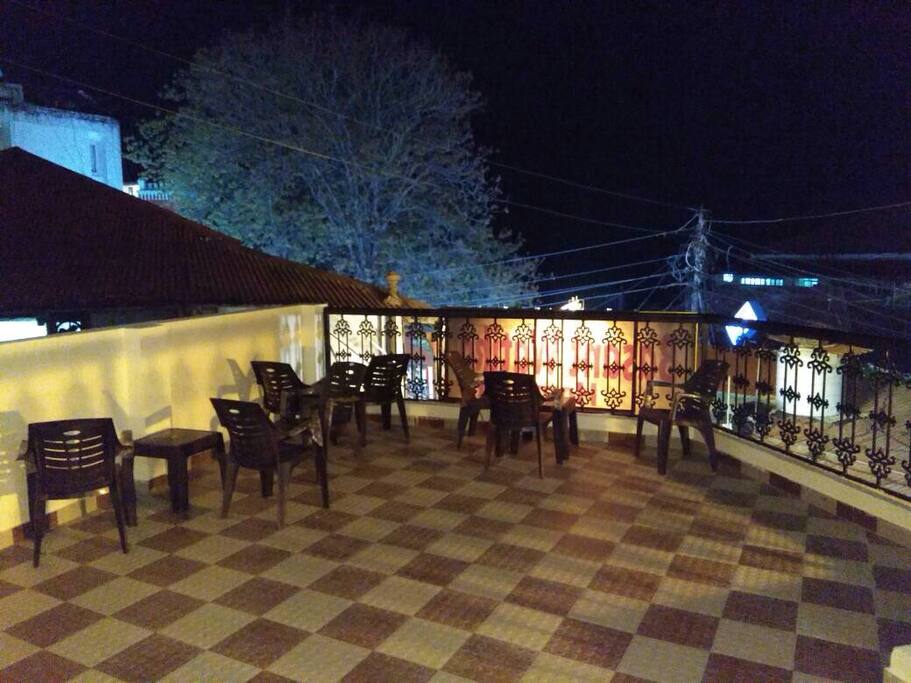 'An open balcony and terrace facing the Mall Road and the entire Doon Valley'