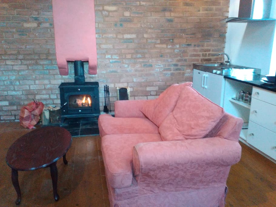 Real log stove. Logs provided for first two nights