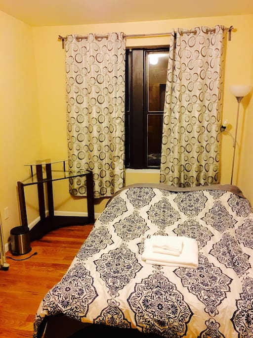 Spacious room with brand new queen bed with memory foam mattress. Has a working desk.