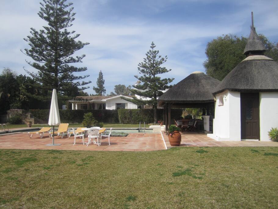 Pool house and outdoor bar area.