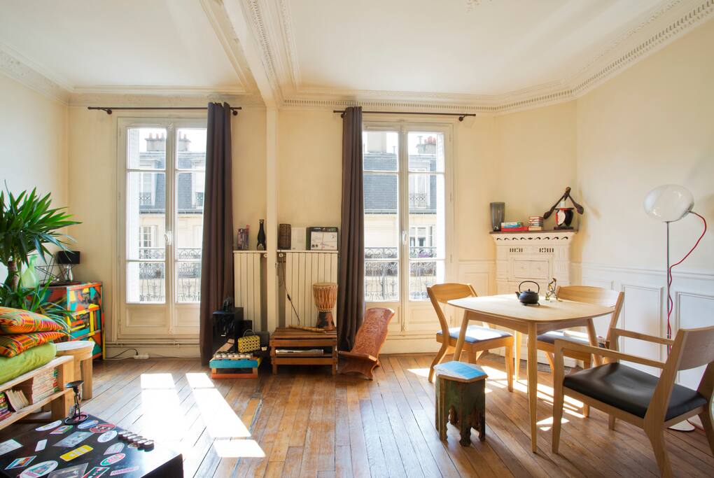 On the left: the living area. On the right: the dining area. In the background: the balcony