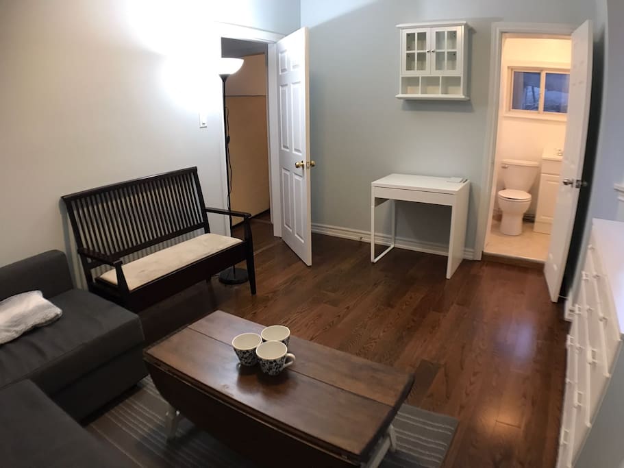 Living room with toilet en suite