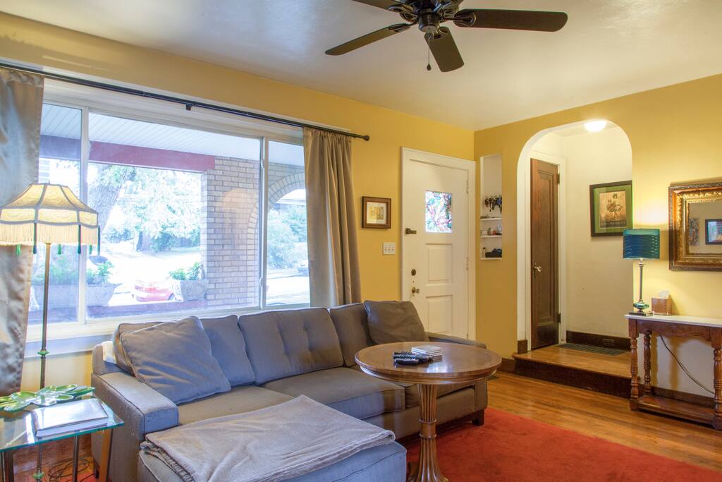 Front door opens into the sunny living room