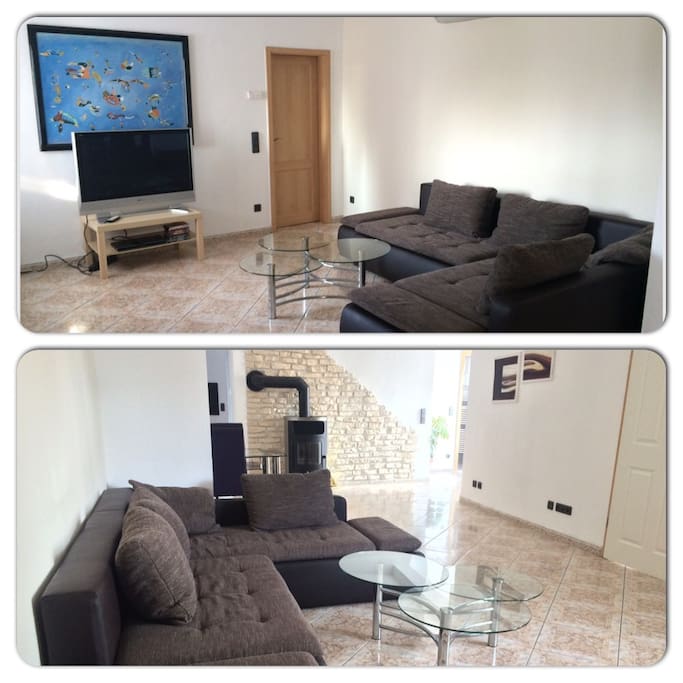 Wohnbereich mit ausziehbarer Couch, großer TV mit DVD Player ...