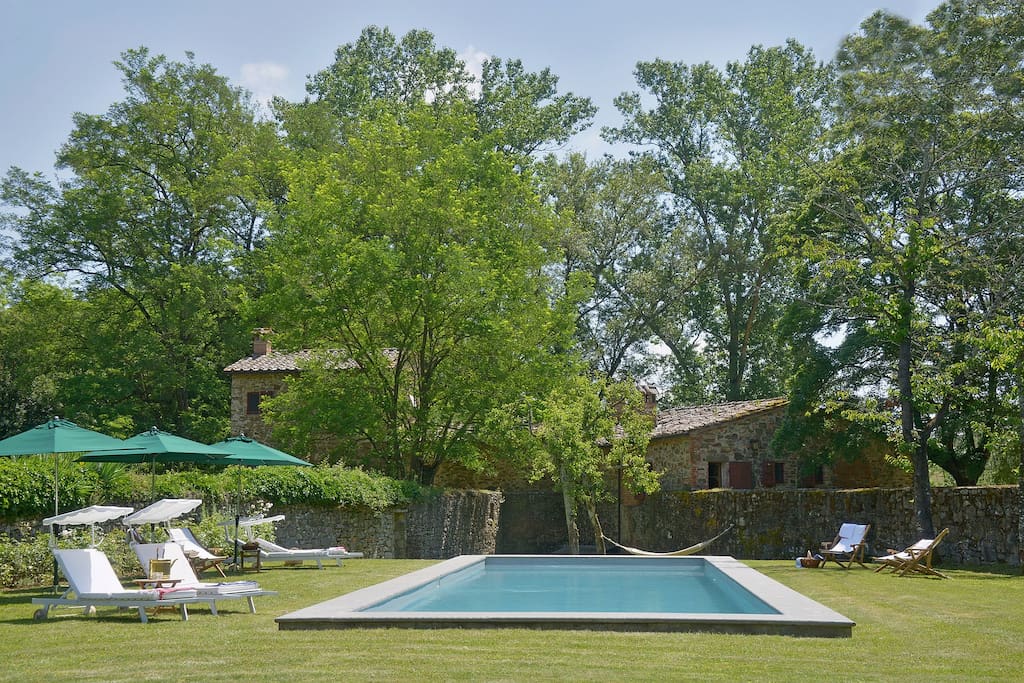 Lounge by the pool amidst the Italian countryside