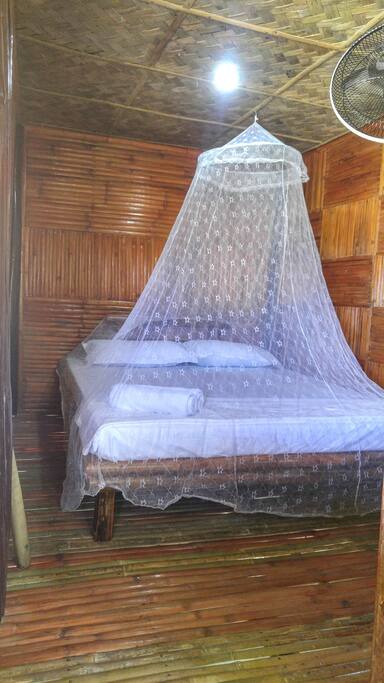 queen bed in family cabana