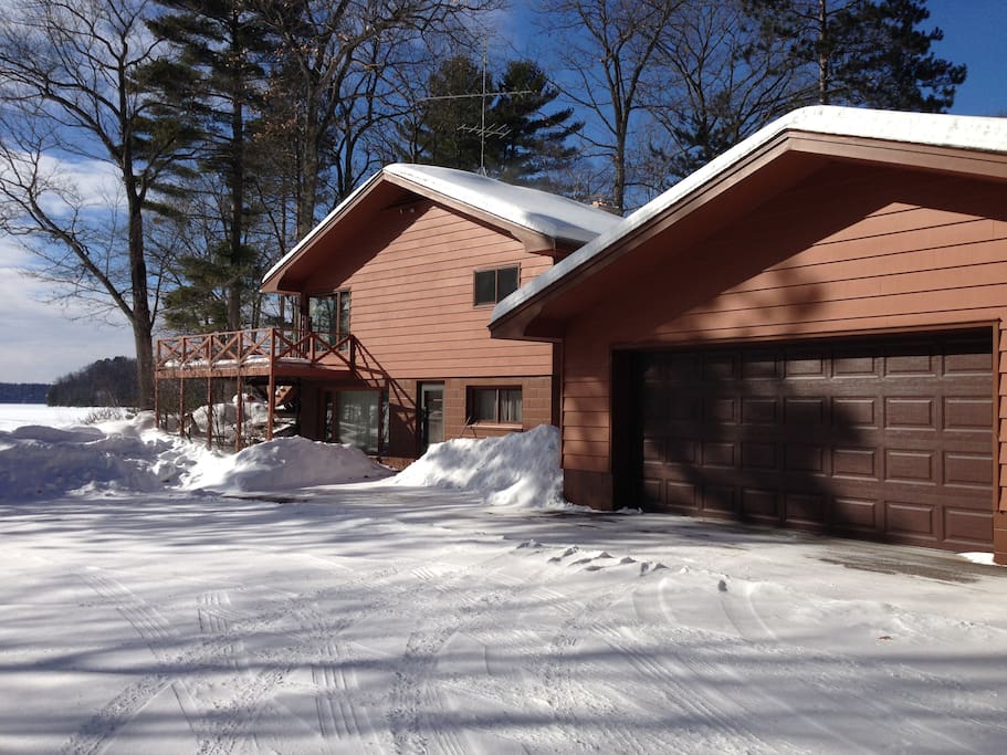 Lower level parking for snowmobiles or boat trailers. Situated with easy access to snowmobile trails.