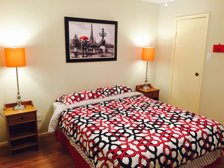 A queen size bed is in bedroom. Nine-leg frame ensures stability.