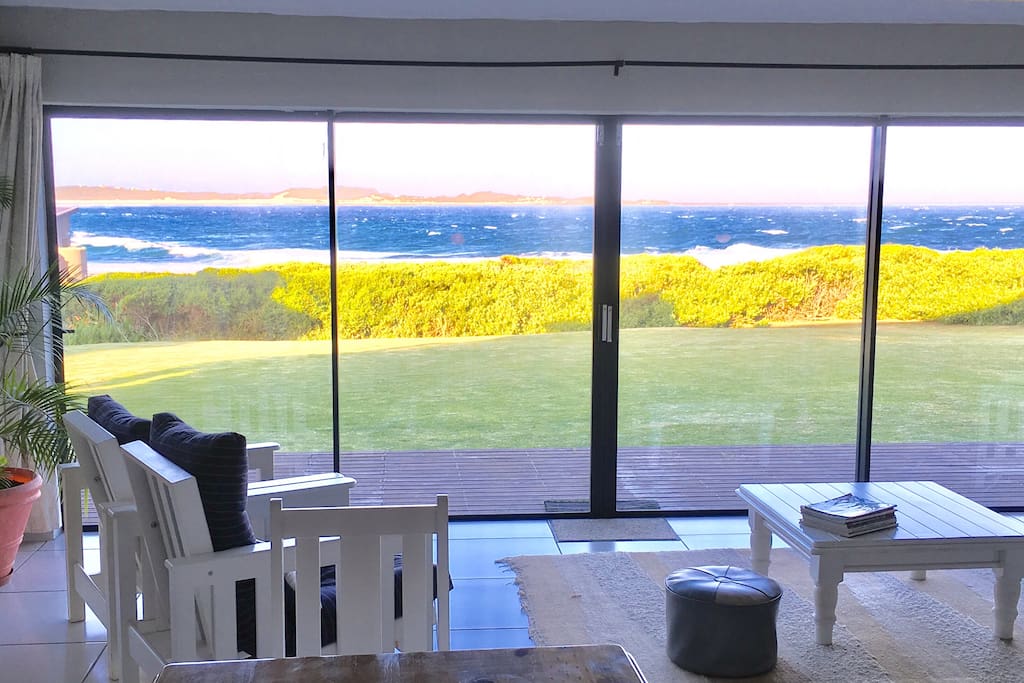 Lounge / open plan area looking NE onto lawn and Seals