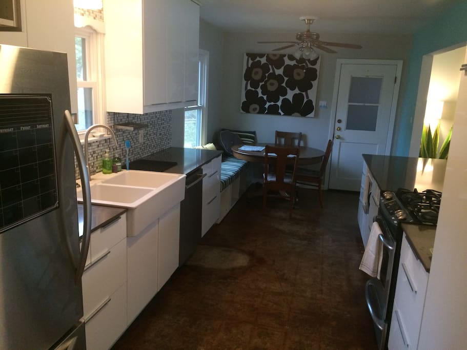 Newly renovated kitchen with all stainless appliances and gas range.