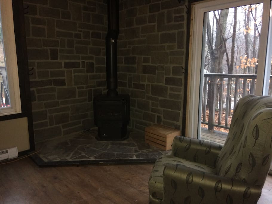 Warm up by gas fireplace in living room.