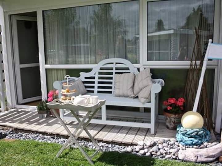 The Summerhouse a cute 1960s chalet near the sea