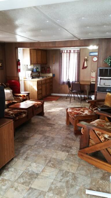 View of main floor. Comfortable sitting. The bathroom has a shower.
