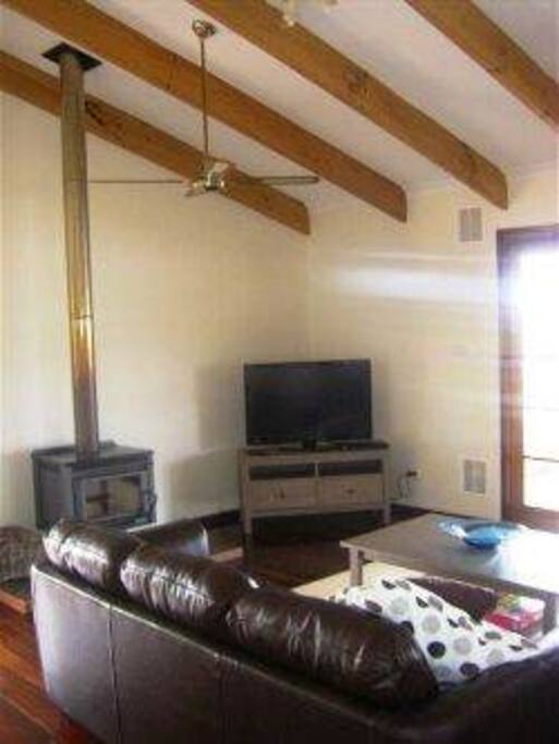 Lounge and TV room with fireplace