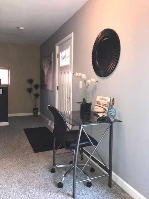 Desk for catching up on work or emails. The door on the right leads out to the private balcony for your use.