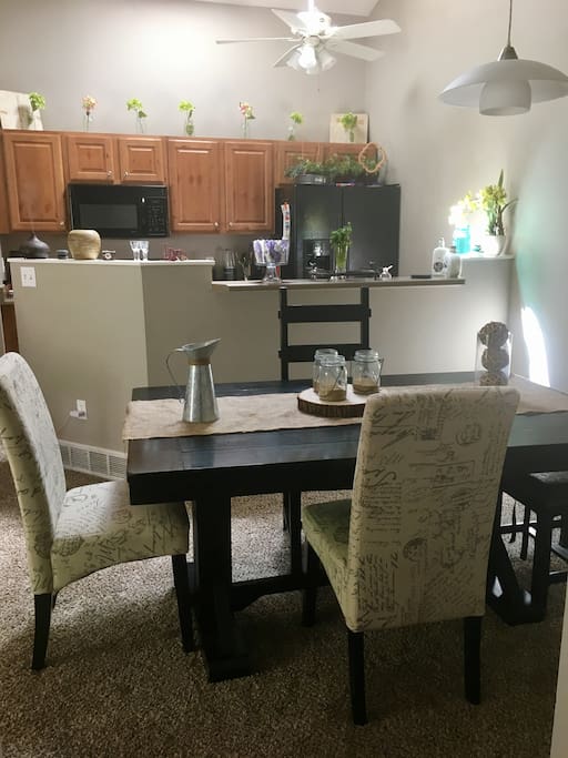 Dining room table and kitchen areas