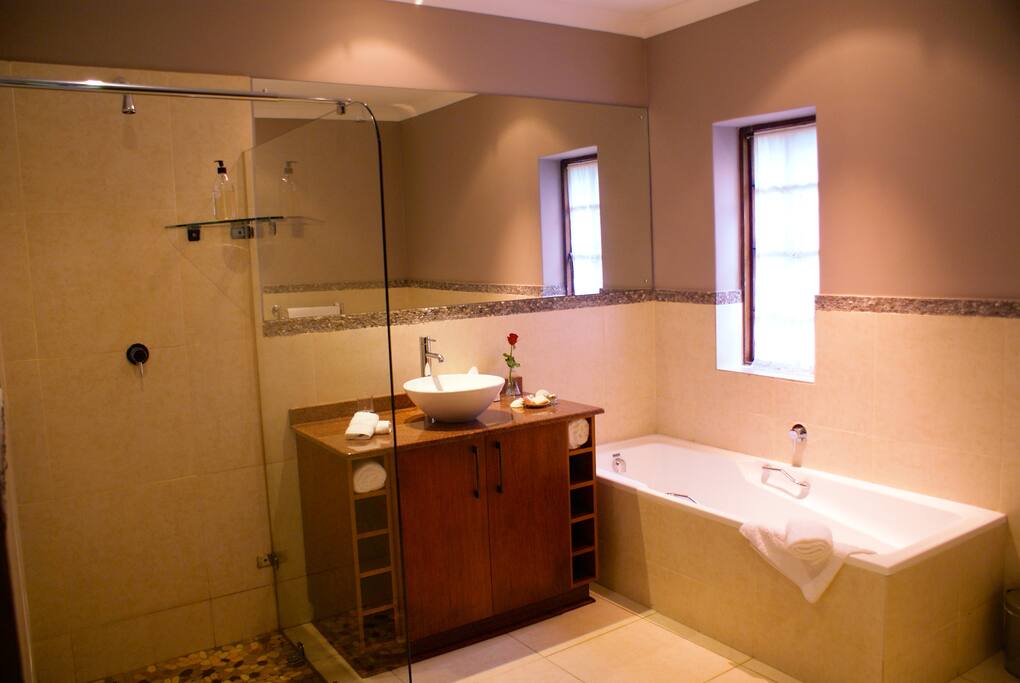 En Suite separate bathroom with shower and bath.