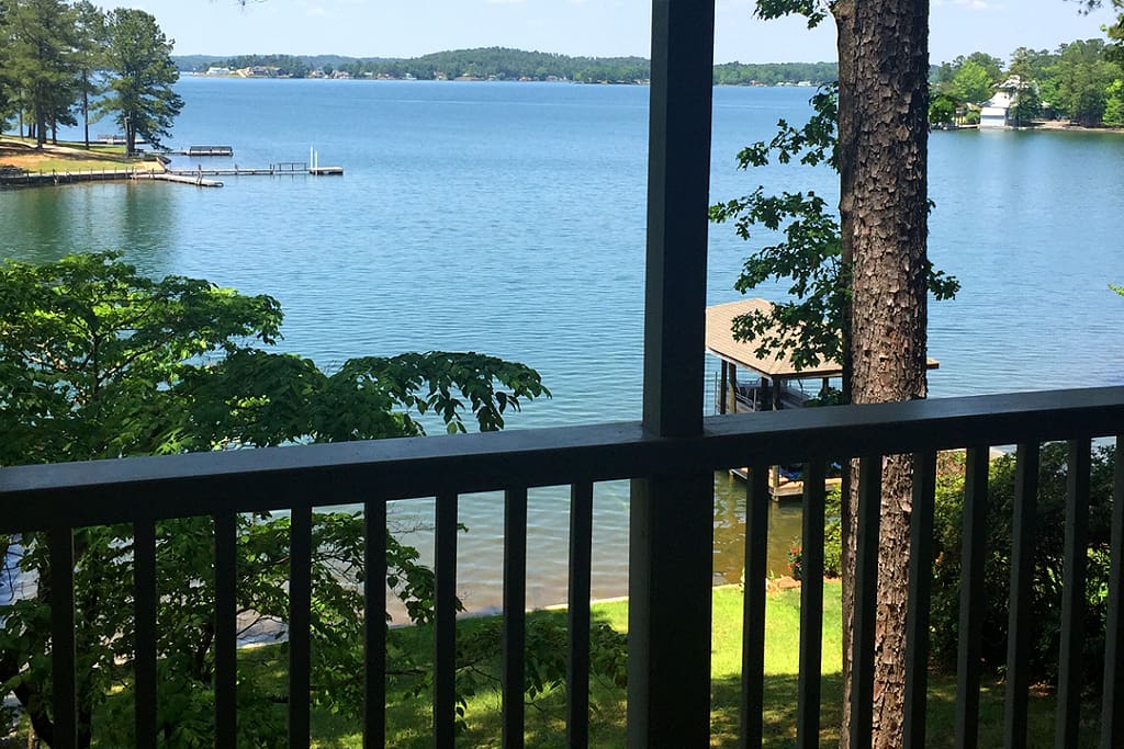 Relax on the porch with beautiful views of Lake Martin, private shoreline and boat dock.