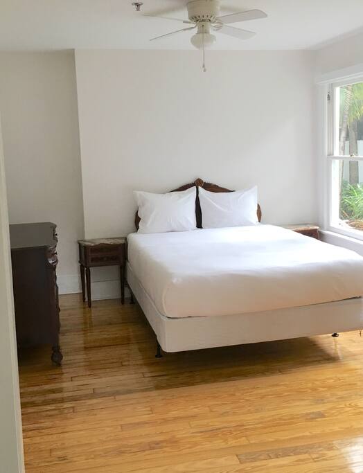 Queen bed with Tuft & Needle premium mattress.