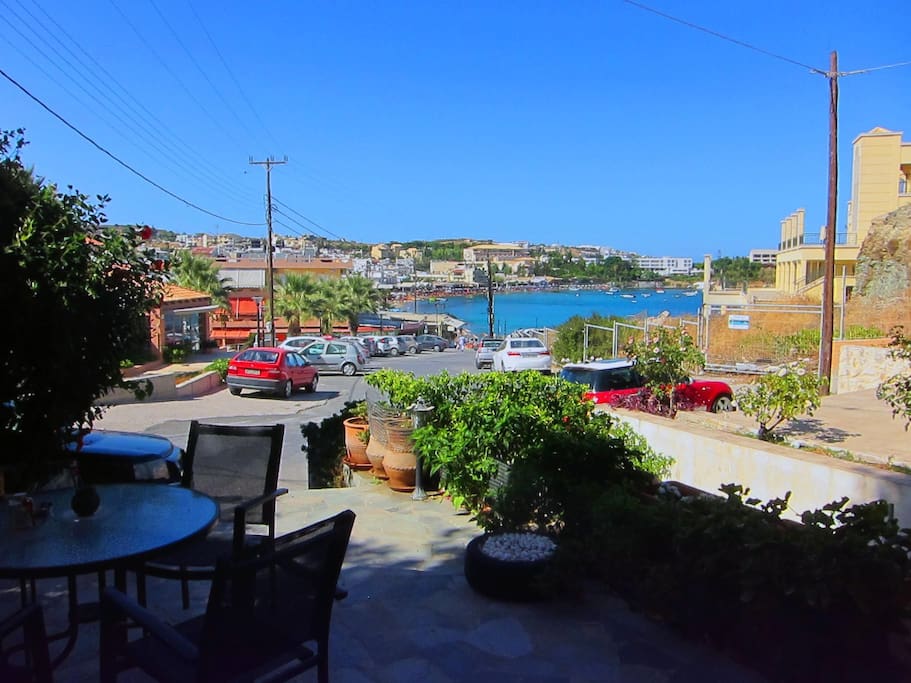 Sea view of Agia Pelagia main sandy beach which locate just 80 metres of property. Private terrace where you can relax on dining table..