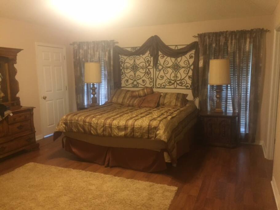 master bedroom with California king bed