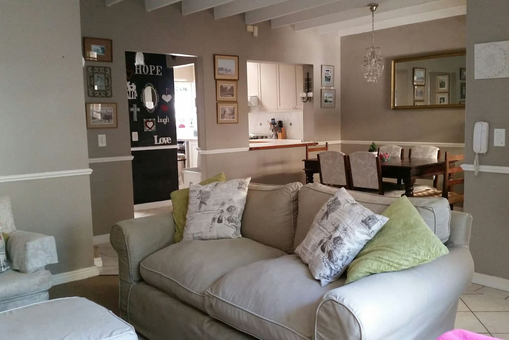 The light and airy open plan lounge dining area, leading into the downstairs bedroom, bathroom and kitchen.